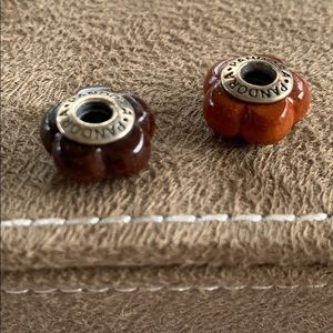 Pandora 2 carved collectors charms